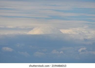 cloudscape in light blue sky