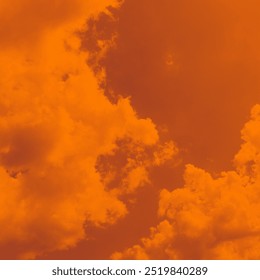 Cloudscape, orange sky with clouds, dramatic heaven, natural background, place for text, color photography