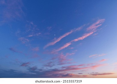 Cloudscape with pink fluffy clouds in sunset sky. - Powered by Shutterstock - Get 15% off with code: PIKWIZARD15