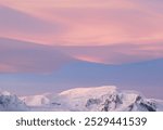 Cloudscape with rare Nacreous clouds at sunset in Antarctica. Sky with mother of pearl clouds