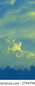 Cloudscape shape like chuckle spin in sky.
