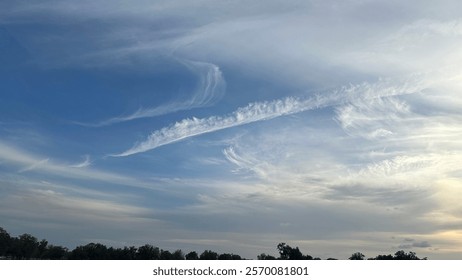 cloudscape skyscape white clouds blue sky sunbeam sunray sunburst