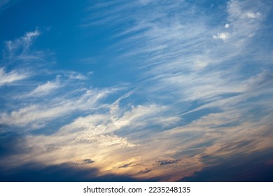 Cloudscape with the sun behind the clouds. Cloudy sky. - Shutterstock ID 2235248135
