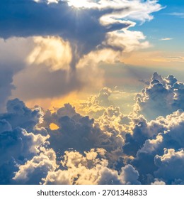 Cloudscape with sun rays breaking through clouds showing divine natural light