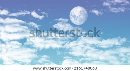 cloudy blue sky and full moon