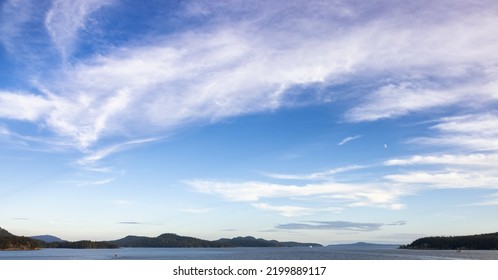 Cloudy Cloudscape during sunny summer Day on the West Coast of Pacific Ocean. British Columbia, Canada. Sunset Sky - Shutterstock ID 2199889117