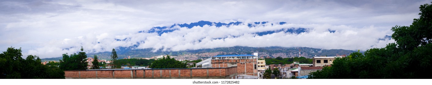 Cloudy Farallones Mountains Panoramic Shot From Cali, Colombia.