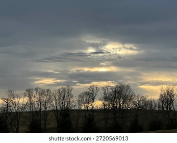 Cloudy HillSide With the Sun Sinking down