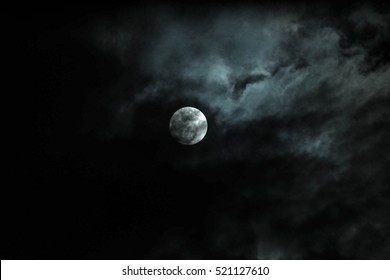 Cloudy Night Sky With Moon.