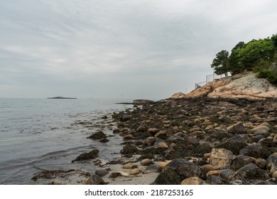 Cloudy Overcast Day At The Rocky West Beach In Beverly, Massachusetts