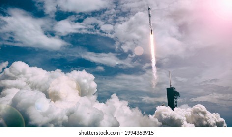 Cloudy rocket launch. The elements of this image furnished by NASA.