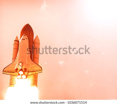 Cloudy rocket launch. The elements of this image furnished by NASA.
