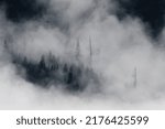 Cloudy Scene with Silhouettes of trees in the background, Taken in Manali, India 