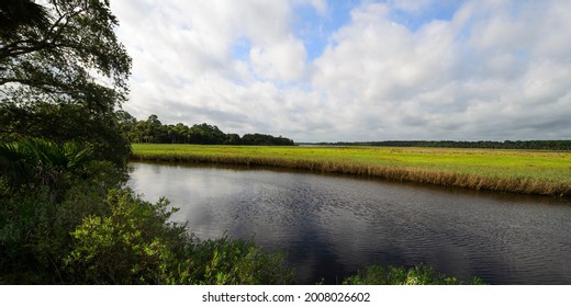 Cloudy Skies Over The Tomoka River In Florida