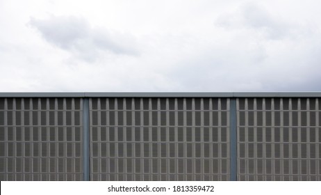 
Cloudy Sky And Noise Barrier