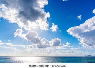 Cloudy sky over Alghero shoreline. Sardinia, Italy