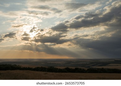 A cloudy sky over a field