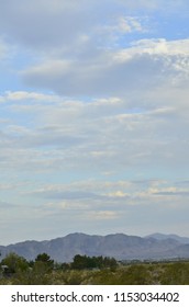 cloudy sky over mountain range in Mojave Desert town of Pahrump, Nevada, USA