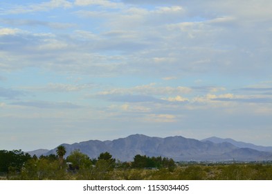cloudy sky over mountain range in Mojave Desert town of Pahrump, Nevada, USA