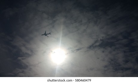 Cloudy sky plane