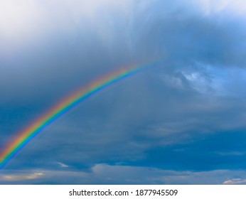 Cloudy Sky With Rainbow After Storm