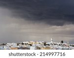 A cloudy sky ready for the rain over spanish village.