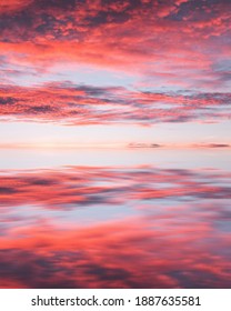 Cloudy Sky Reflection In Water