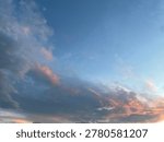 Cloudy sky skyscape with light rays at sunset
