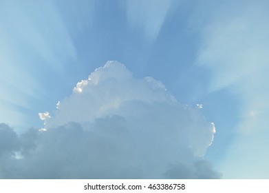 cloudy sky with sunbeams