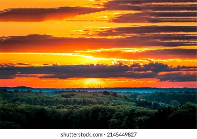 Cloudy sky at sunset landscape. Beautiful sunset in countryside. Countryside sunset landscape. Sunset sky clouds landscape - Shutterstock ID 2145449827