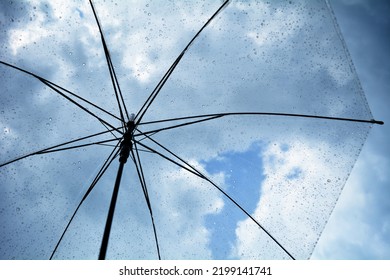 Cloudy Sky Under A Clear Umbrella