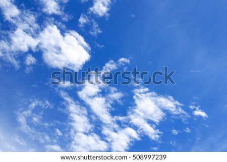 Cloudy in the sky.blue sky and white clouds.Clouds floating in the sky.Bright blue background. Relaxing feeling like being in the sky.Clouds are aerosols that consist of mass of ice drops in the air.