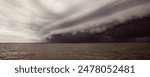 Cloudy storm in the sea before rainy.tornado storms cloud above the sea. Monsoon season. Storm in the sea.Wonder of natural disaster.Cloud before rain,Sky before the storm.use for background wallpaper