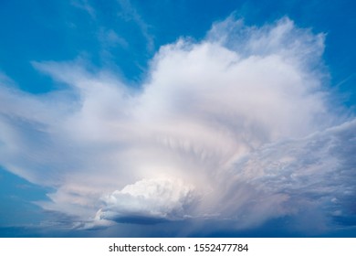 Cloudy stormy dramatic sky with lightning strike. Thunder cloudscape. Meteorology