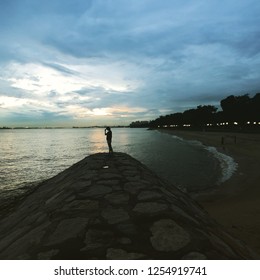 Cloudy Sunset by the Beach