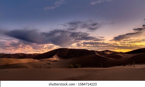 Cloudy Sunset In The Lut Desert