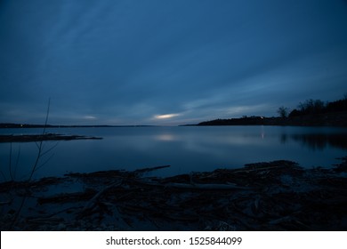 Cloudy Sunset Over A Lake At Tuttle Creek Kansas.