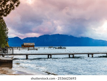 Cloudy Sunset Over Piers and Boathouse on Eldorado Beach, South Lake Tahoe, California, USA - Powered by Shutterstock