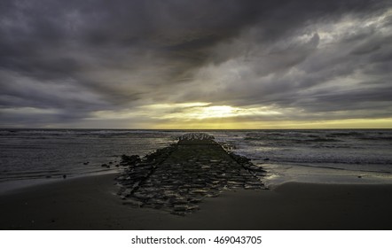 A cloudy sunset at the pier