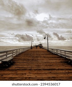 Cloudy view of pier and ocean