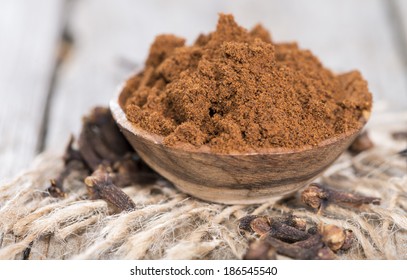 Clove Powder In A Small Bowl (close-up Shot)