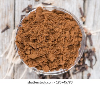 Clove Powder In A Small Bowl (close-up Shot)