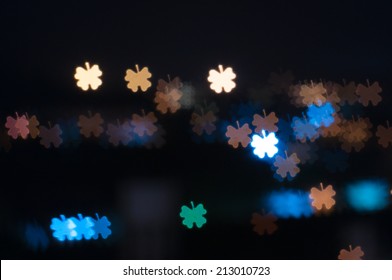 Clover Leaf Shape Bokeh Background Of City At Night