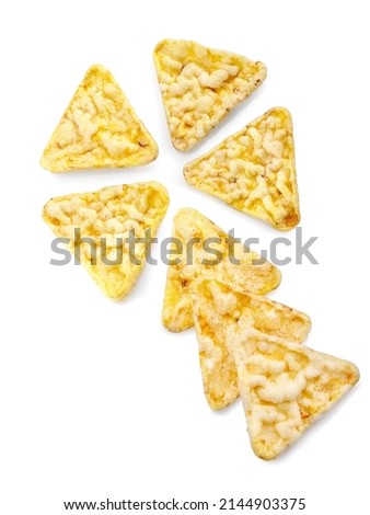 Clover from triangular corn snack on white background