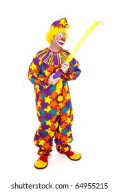 Clown Blows Up A Special Balloon For Making Balloon Animals.  Full Body Isolated On White.