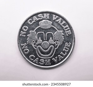 Clown coin with no cash value on a white background