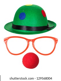 Clown hat with glasses and red nose isolated on white background