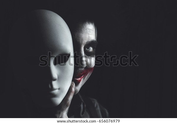 Clown Hiding His Self Behind Anonymous Stock Photo (Edit Now) 656076979