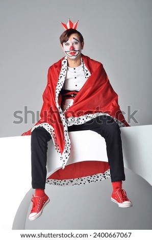 clown king. jester joker, emotions