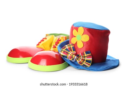 Clown Shoes, Bow And Hat On White Background